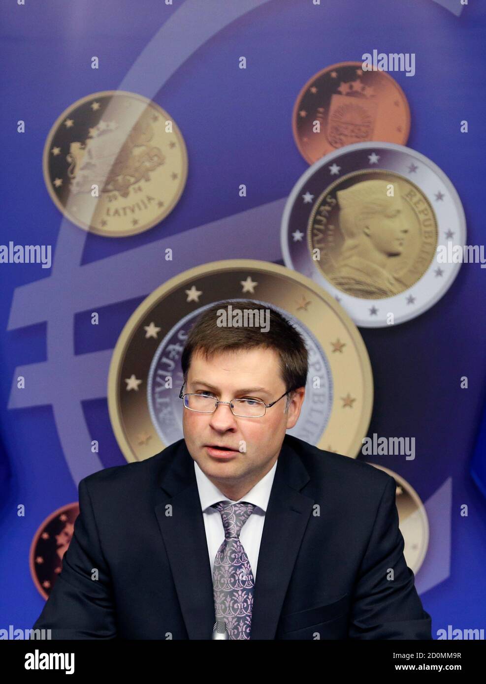 Latvia's Prime Minister Valdis Dombrovskis addresses a news conference on the adoption of the euro by Latvia at the European Union council building in Brussels July 9, 2013. The euro zone embraced tiny Latvia as its newest member on Tuesday, eager to show that the bloc is not disintegrating while doubts remain about southern Europe's ability to overcome more than three years of crisis.   REUTERS/Francois Lenoir (BELGIUM - Tags: POLITICS BUSINESS) Stock Photo
