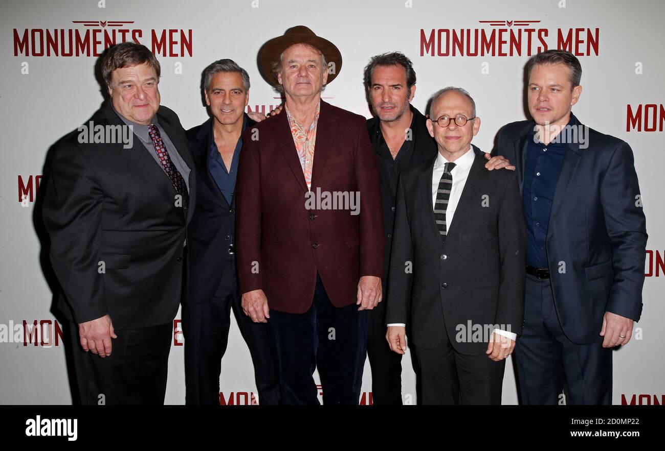 Cast members John Goodman (L-R), George Clooney, Bill Murray, Jean Dujardin,  Bob Balaban and Matt Damon arrive for the French premiere of the film "The  Monuments Men" in Paris February 12, 2014.