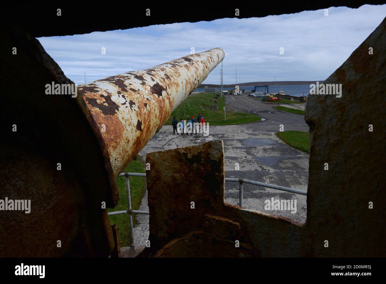 A salvaged gun from SMS Bremse stands in the Lyness museum on the island of Hoy in the Orkney Islands, Scotland May 6, 2014. During both World Wars, Scapa Flow was an important British naval base, and the site of significant loss of life. Following the end of World War One, 74 German warships were interned there, and on June 21, 1919 most were deliberately sunk, or scuttled, at the orders of German Rear Admiral Ludwig Von Reuter, who mistakenly thought that the Armistice had broken down and wanted to prevent the British from using the ships. Now Scapa Flow is a popular site for divers, who exp Stock Photo