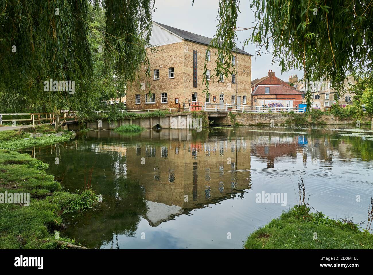 'Millworks', a former mill on a bank of the river Cam at Mill pond, Cambridge, England, now converted to a restaurant and brasserie. Stock Photo