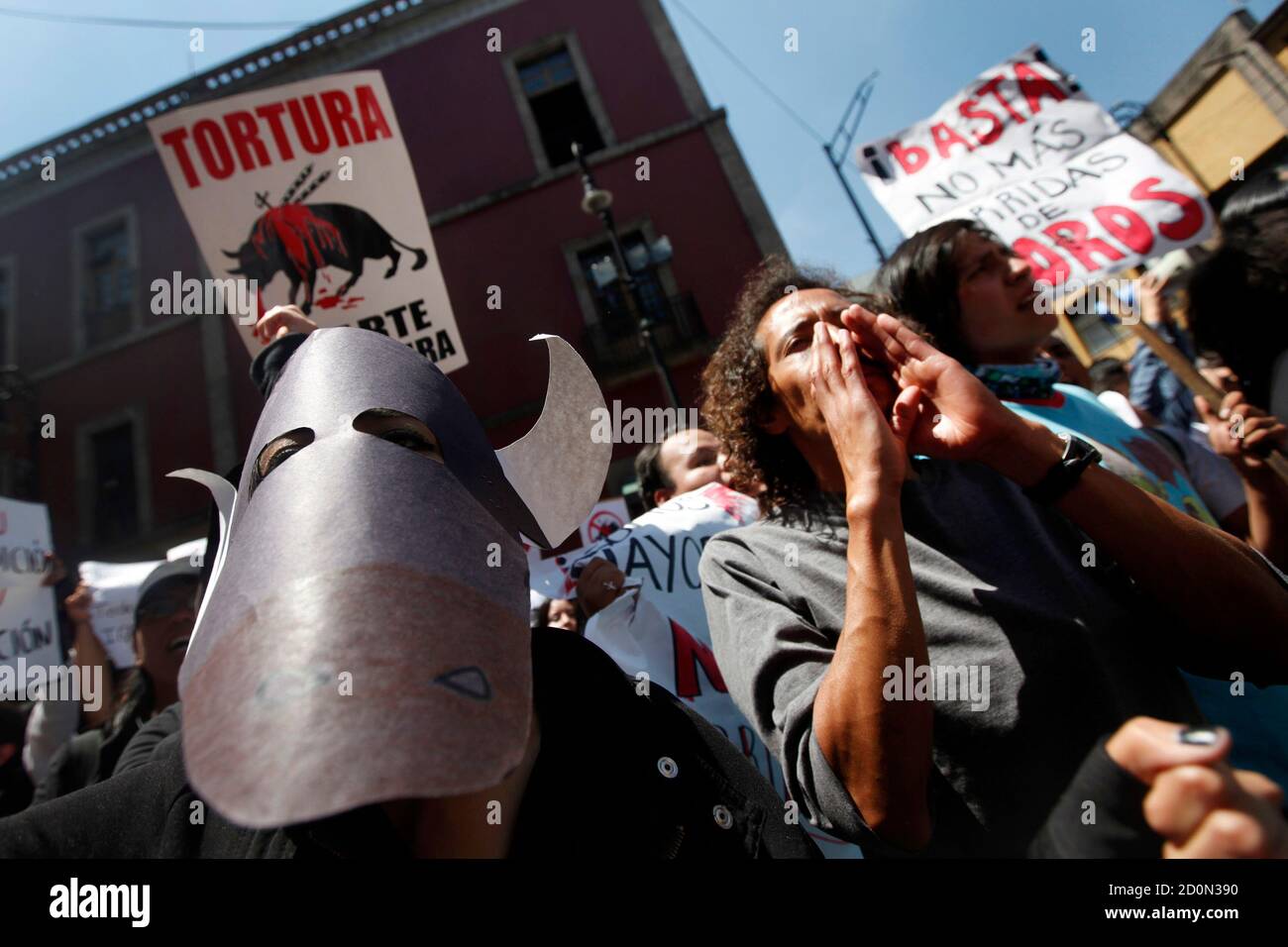 Activists protest against bullfighting outside the Legislative Assembly of the Federal District building in Mexico City, April 26, 2012. The Legislative Assembly of the Federal District will meet on Thursday to evaluate a legal reform to ban bullfighting in the country's capital.  REUTERS/Edgard Garrido  (MEXICO - Tags: ANIMALS CIVIL UNREST) Stock Photo