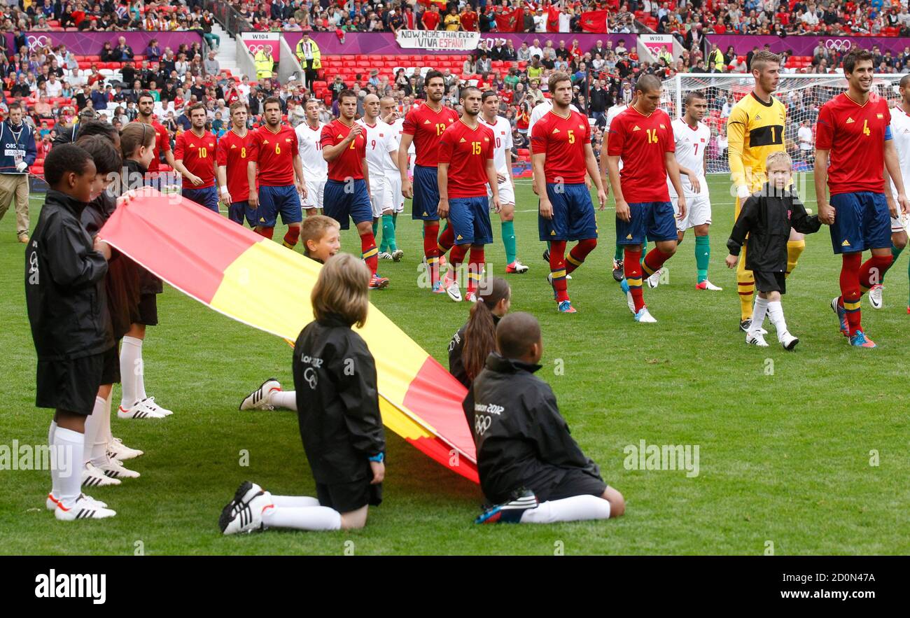 The Spanish Team Marches Into The Stadium For The Spain Morocco Football Match In Men S Group D Football At The London 2012 Olympic Games At Old Trafford In Manchester August 1