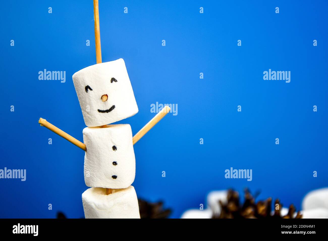 DIY white marshmallows sweet treat for kids funny marshmallow christmas snowman. Step by step. Copy space Stock Photo