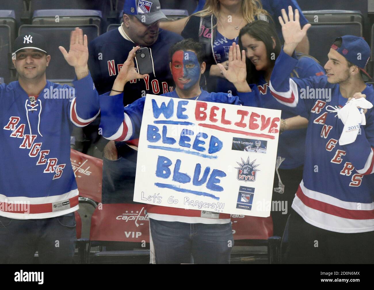 New York Rangers fans cheer on their 