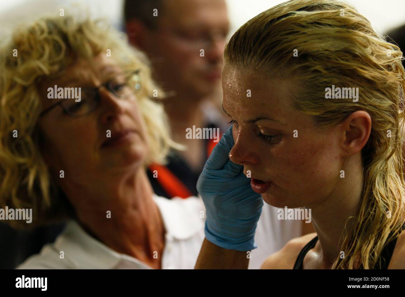 Germany's Britta Steffen is lactate tested after winning the women's 50m freestyle finals at the German Swimming Championships in Berlin June 5, 2011. REUTERS/Wolfgang Rattay (GERMANY - Tags: SPORT SWIMMING) Stock Photo
