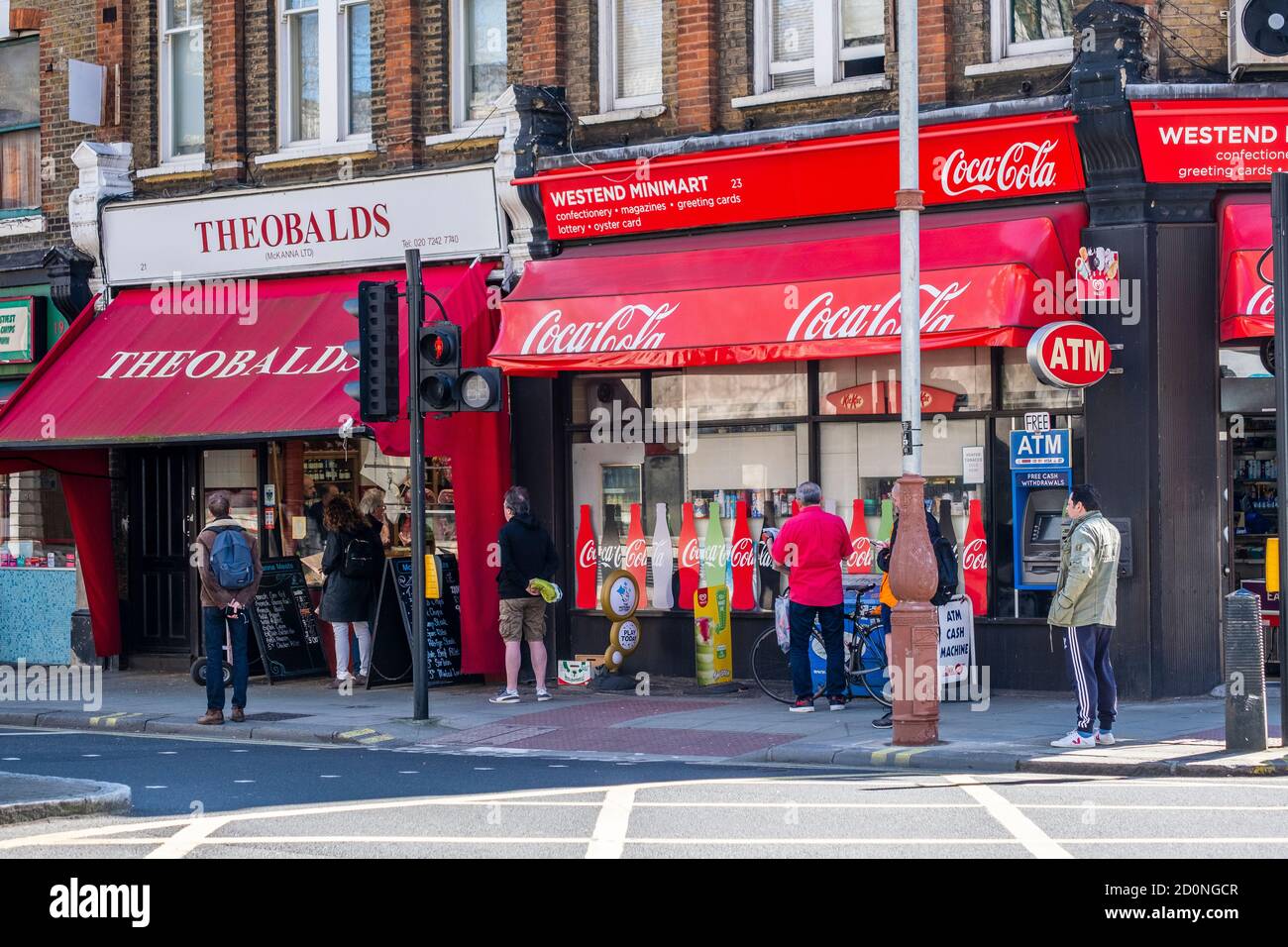 Queuing for essential shopping in London during the pandemic lockdown. Stock Photo