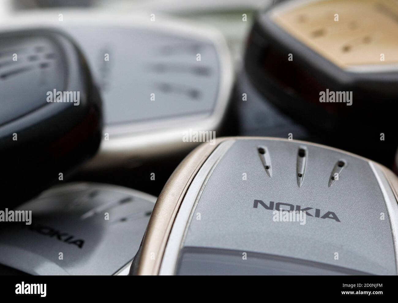 Illustration picture shows Nokia logo on used cell phones, in Zurich, April  30, 2012. REUTERS/Christian Hartmann (SWITZERLAND - Tags: BUSINESS TELECOMS  Stock Photo - Alamy