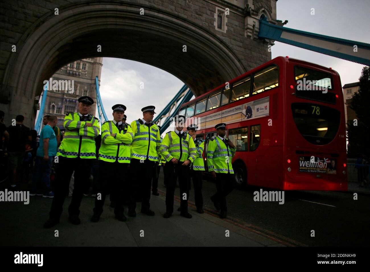 Police stop cars on the Tower Bridge during the night of the opening ceremony of London 2012 Olympic Games in London July 27, 2012. REUTERS/Mark Blinch (BRITAIN - Tags: SPORT OLYMPICS CRIME LAW) Stock Photo