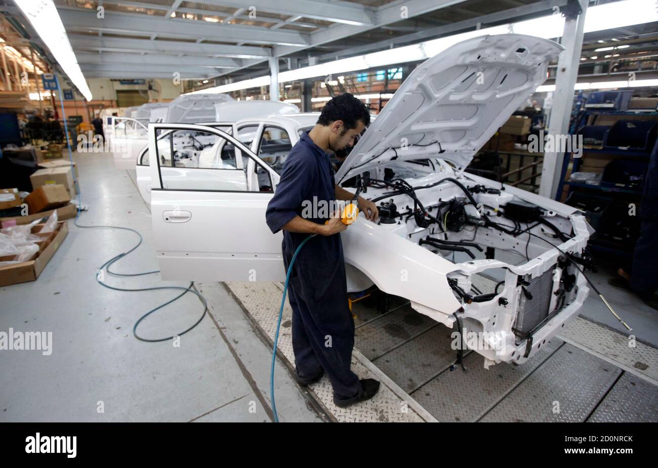A Man Works In An Assembly Line Of Hyundai Cars In Egypt S Biggest Car Assembler Gb Auto In Cairo September 10 2013 Gb Auto Is Having To Adjust Its Relationship With Hyundai