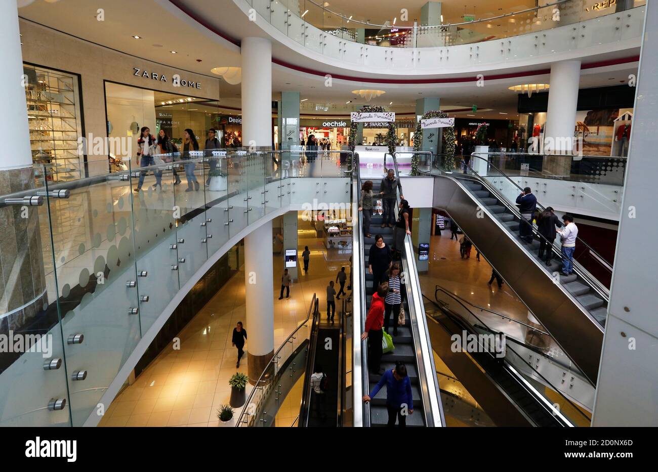 People walk past a Zara Home store at Real Plaza Salaverry shopping mall in  Lima, September 23, 2014. REUTERS/ Mariana Bazo (PERU - Tags: SOCIETY  BUSINESS Stock Photo - Alamy