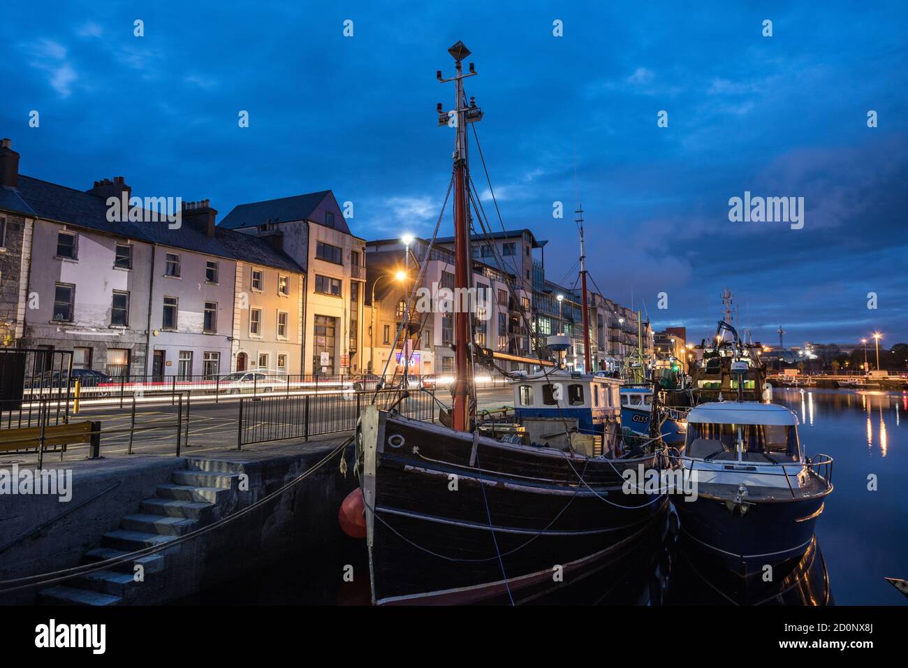 GALWAY CITY, IRELAND - 4th May, 2018:  Galway city harbour docklands illuminated at night Stock Photo