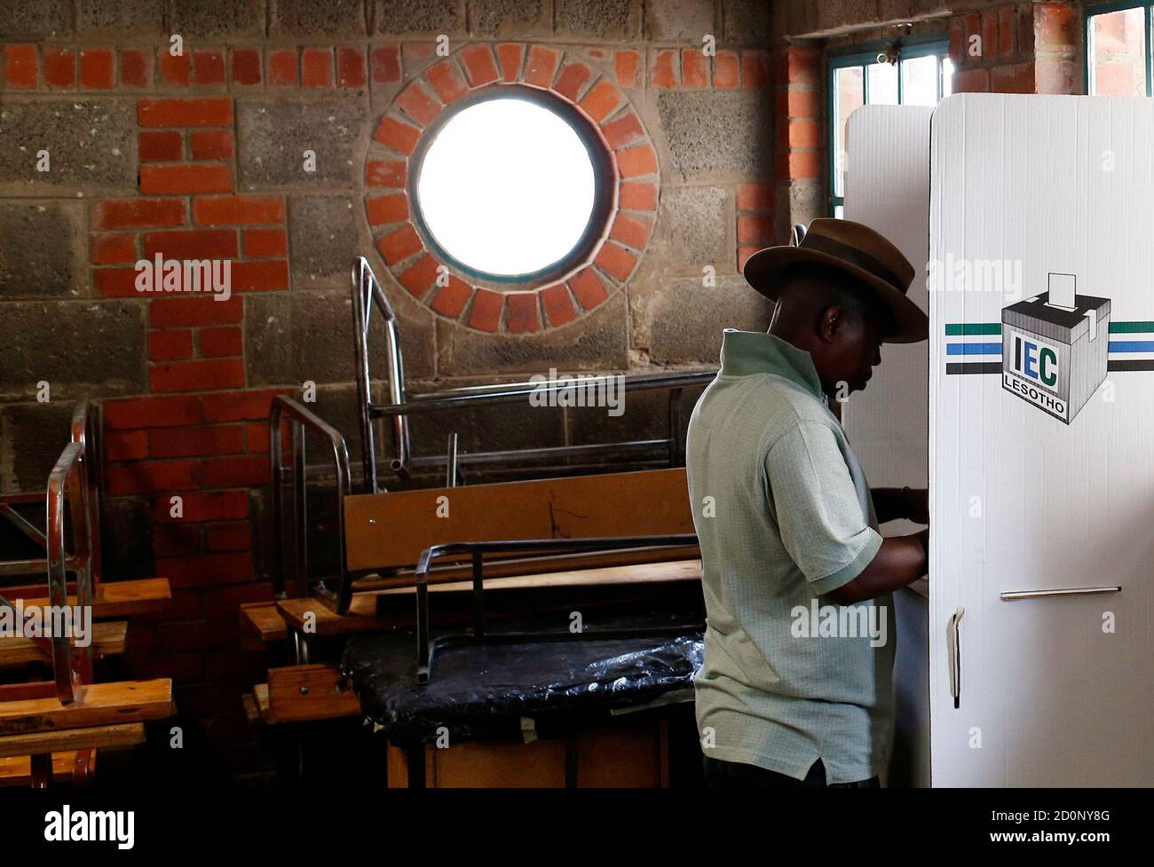 A local casts his vote during the national election in Qoaling village, outside the capital Maseru February 28, 2015. The people of Lesotho voted on Saturday in a tense election they hope will restore stability six months after an attempted coup in the southern African nation.The vote is being held around two years ahead of schedule under a political deal brokered by South African deputy president Cyril Ramaphosa. REUTERS/Siphiwe Sibeko (LESOTHO - Tags: POLITICS ELECTIONS) Stock Photo