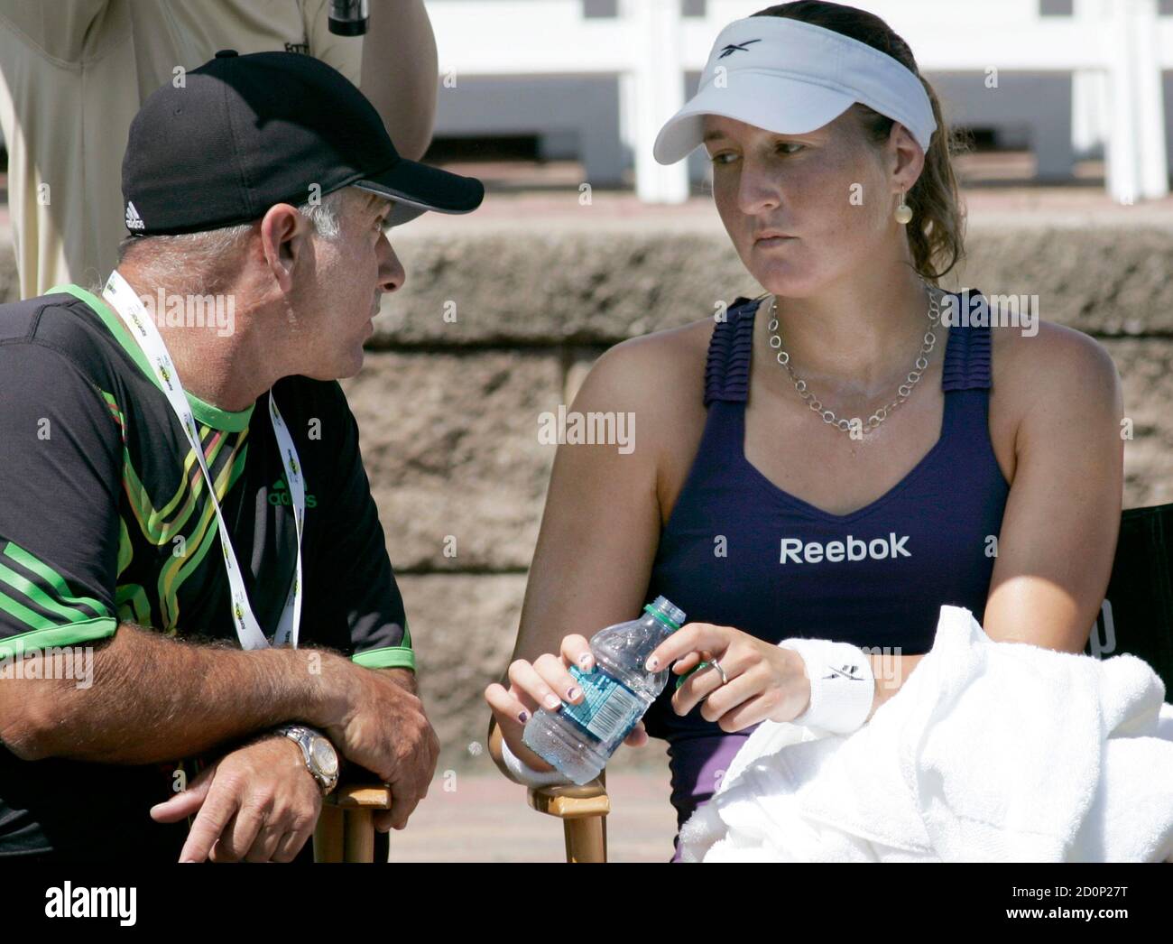 Shahar Peer of Israel talks to her coach Harold Salomon during her women's  singles tennis match with Julia Georges of Germany at the Family Circle Cup  in Charleston April 7, 2011. REUTERS/Mary