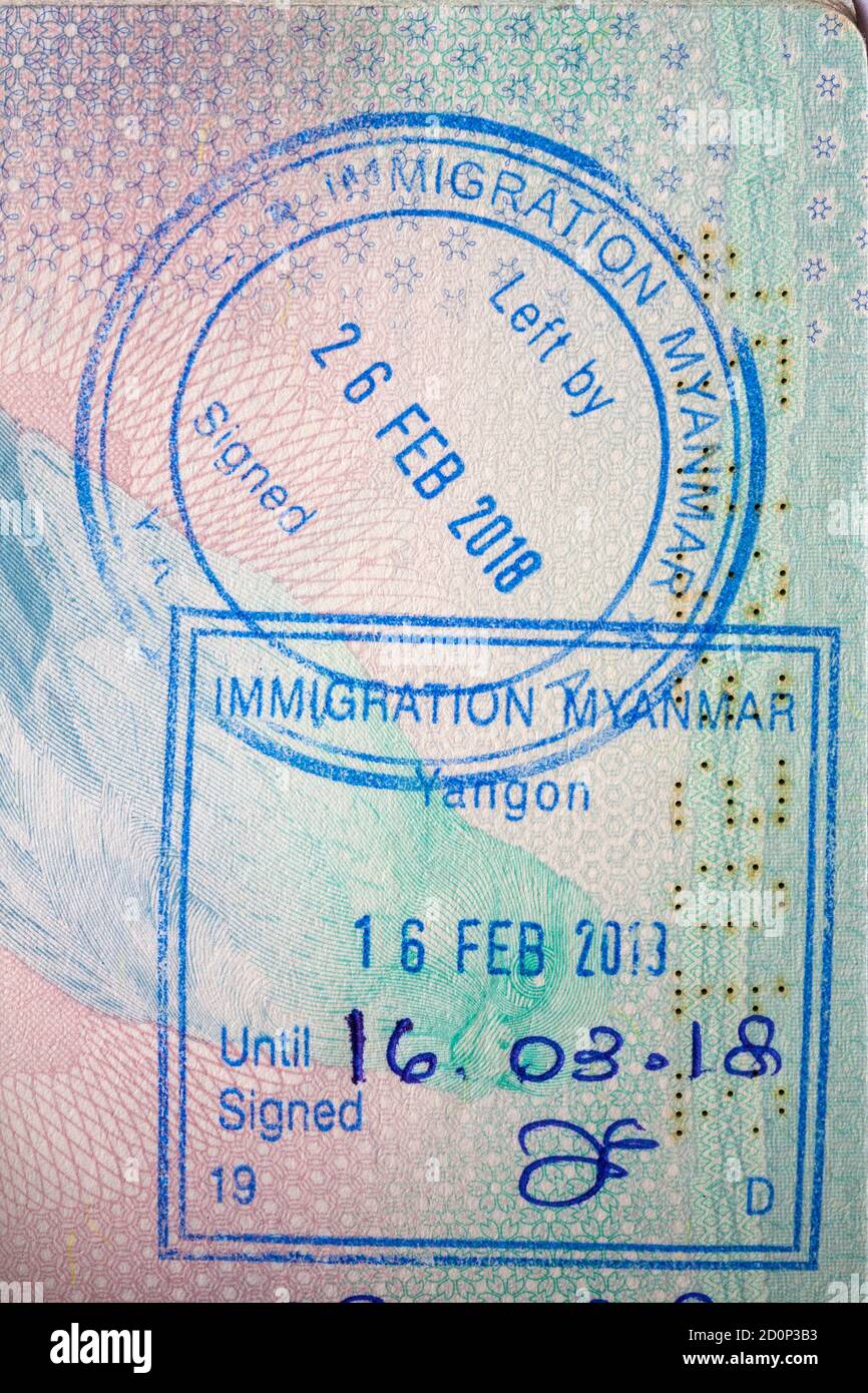 Myanmar stamps in British passport - immigration Myanmar stamp Stock Photo  - Alamy