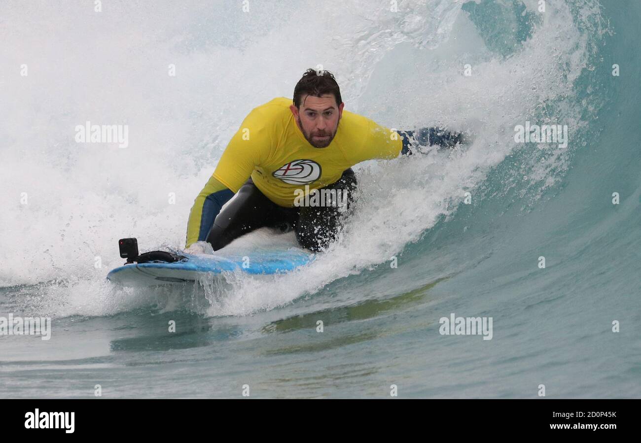 Mike Pingatore takes part in the 2020 Korev Lager English Adaptive Surfing Open at The Wave in Bristol. Stock Photo