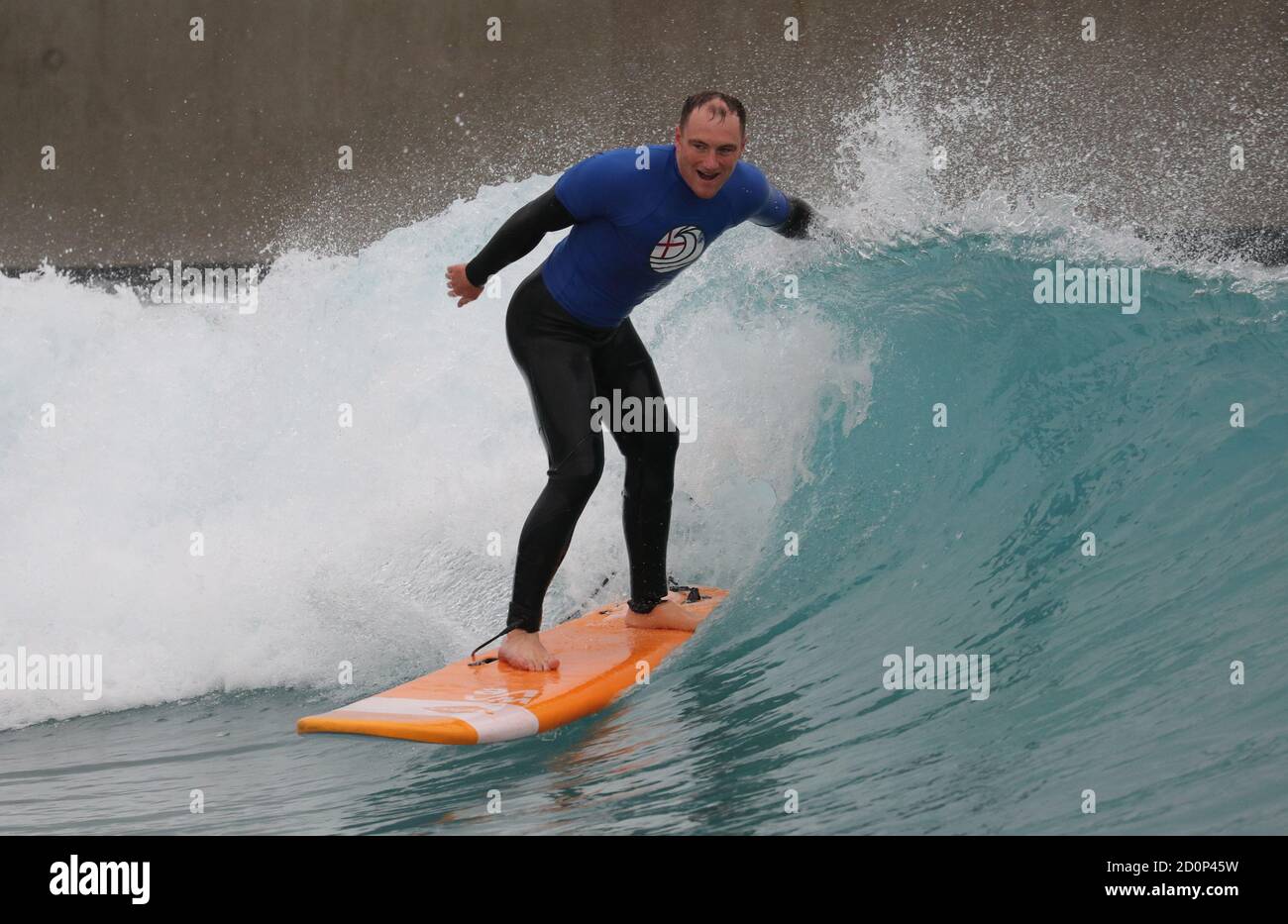 Mike Taylor takes part in the 2020 Korev Lager English Adaptive Surfing Open at The Wave in Bristol. Stock Photo