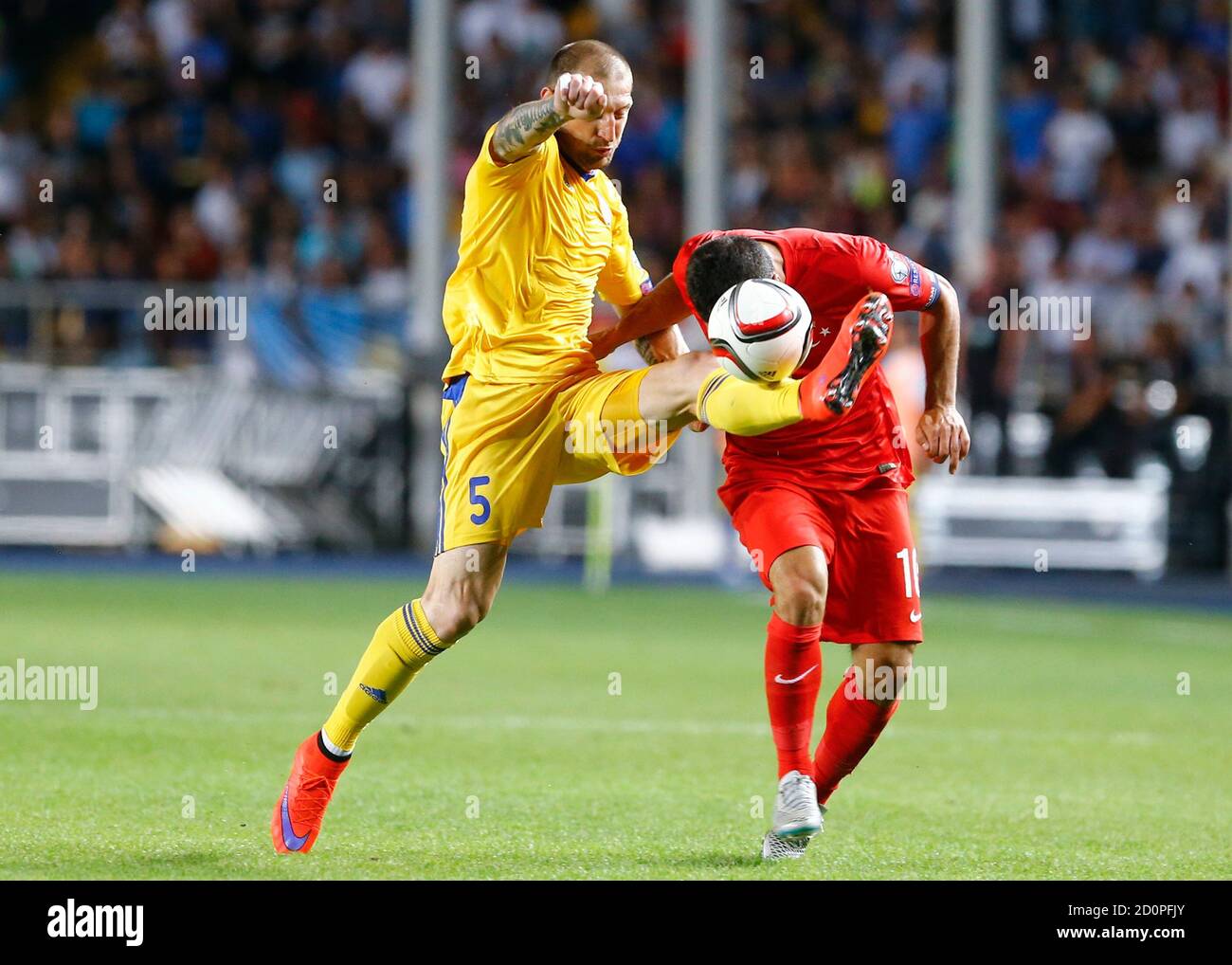 Kazakhstan S Renat Abdulin L Fights For The Ball With Turkey S Arda Turan During Their Euro 16