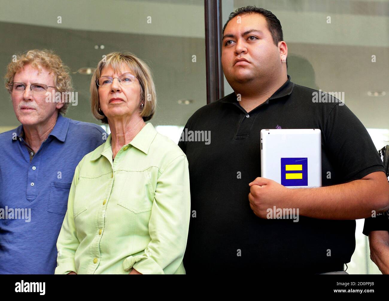 Survivors Of The Tucson Shooting Rampage Randy Gardner L R Pam Simon And Daniel Hernandez Jr Listen During A News Conference Outside The U S Federal Courthouse After A Court Hearing For Shooting Suspect