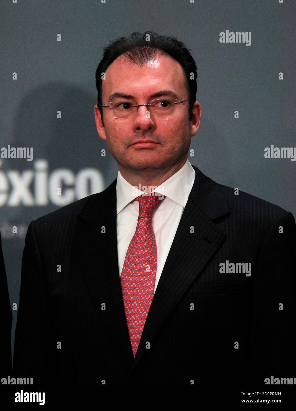 Luis Videgaray, Mexico's newly appointed finance minister, attends the presentation of incoming President Enrique Pena Nieto's cabinet in Mexico City November 30, 2012. Pena Nieto on Friday named close allies to head the important finance and interior ministries as he seeks to spur growth and reduce drug-related violence in Latin America's second-biggest economy. Pena Nieto will be sworn in as president on December 1. REUTERS/Edgard Garrido (MEXICO - Tags: POLITICS BUSINESS) Stock Photo