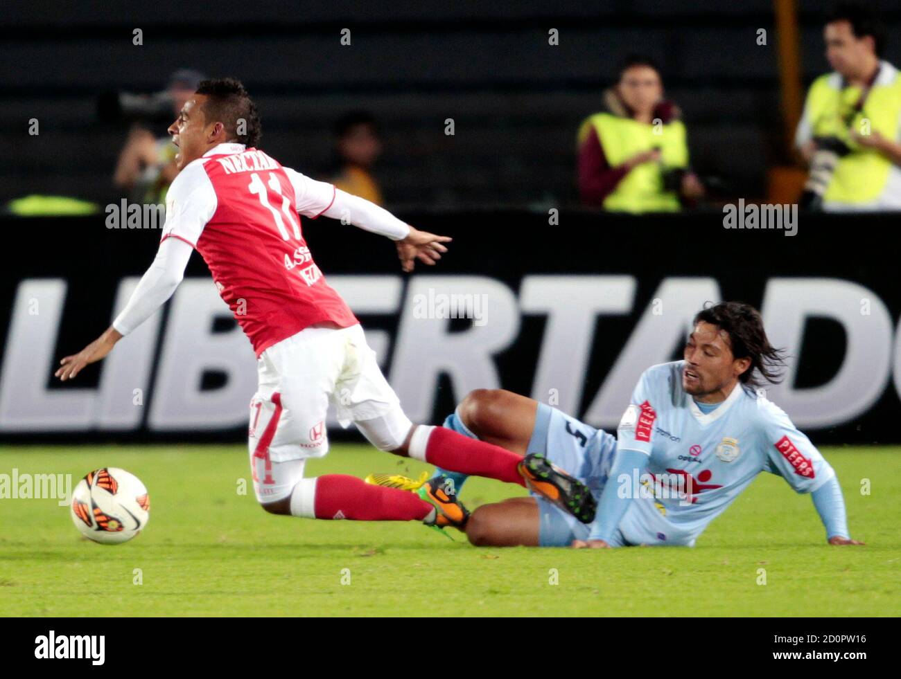 Wilder Medina L Of Colombia S Santa Fe Is Fouled By Rolando Bogado Of Peru S Real Garcilaso During Their Copa Libertadores Match In Bogota April 16 13 Reuters Jose Miguel Gomez Colombia s Wilder Medina L Of Colombia S Santa Fe Is Fouled By Rolando Bogado Of Peru S Real Garcilaso During Their Copa Libertadores Match In Bogota April 16 13 Reuters Jose Miguel Gomez Colombia s