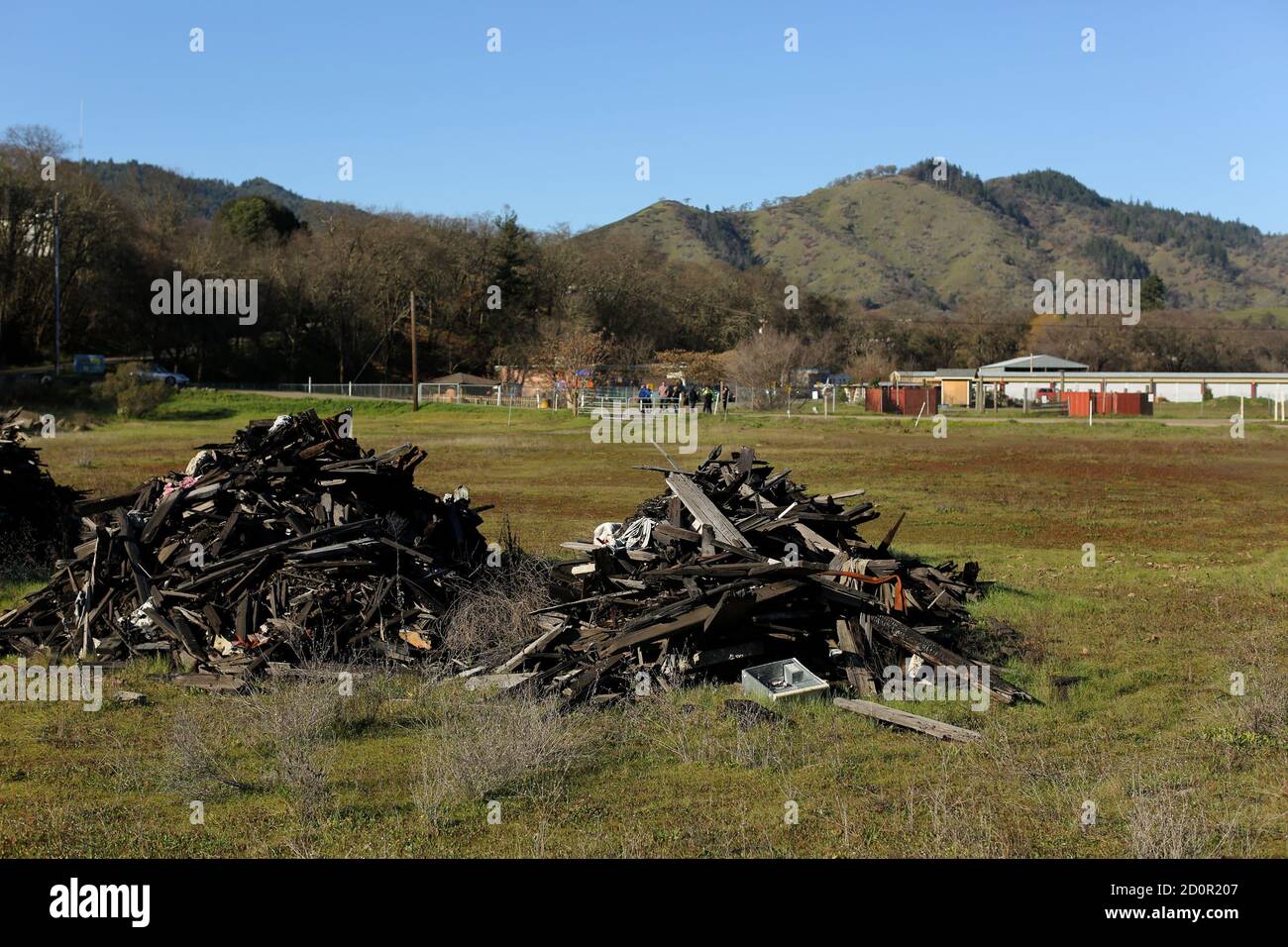 Wood is shown stacked in a field owned by the 250-member Pinoleville Pomo Nation in Ukiah, California January 23, 2015. An initial 10,000-square-foot state-of-the art greenhouse is scheduled to be erected within weeks on the land, in a joint marijuana production and processing venture with FoxBarry Farms of Kansas and the United Cannabis Corporation of Colorado. It's widely believed to be the first of its kind in the nation. The pioneering venture could signal a major wave of new marijuana operations across the nation to bring green to tribal bank accounts. Picture taken January 23, 2015.  REU Stock Photo
