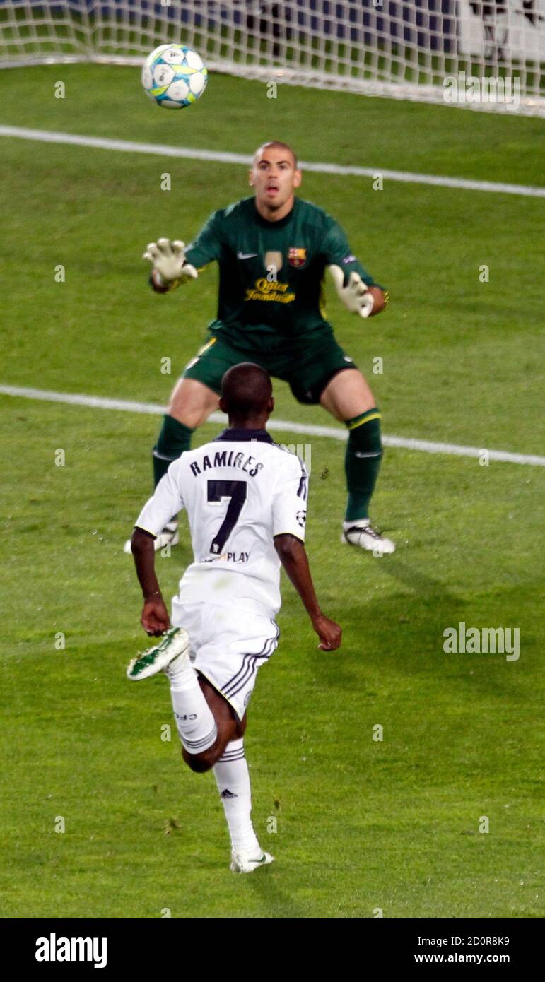 Chelsea's Ramires scores a goal over Barcelona's Victor Valdes during their Champions  League semi-final second leg soccer match at Camp Nou stadium in Barcelona,  April 24, 2012. REUTERS/Gustau Nacarino (SPAIN - Tags: