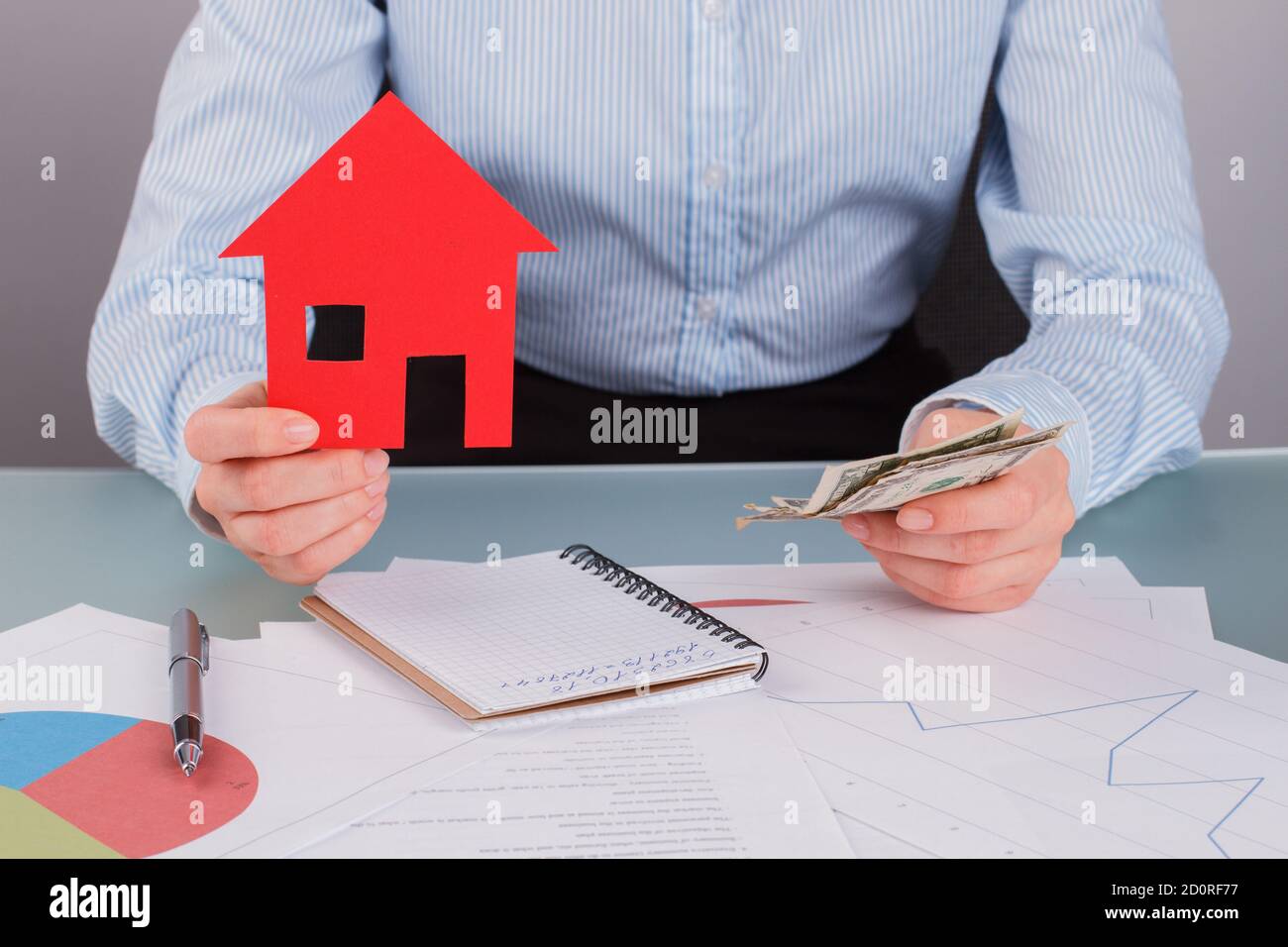 Arms money buying house hi-res stock photography and images - Alamy
