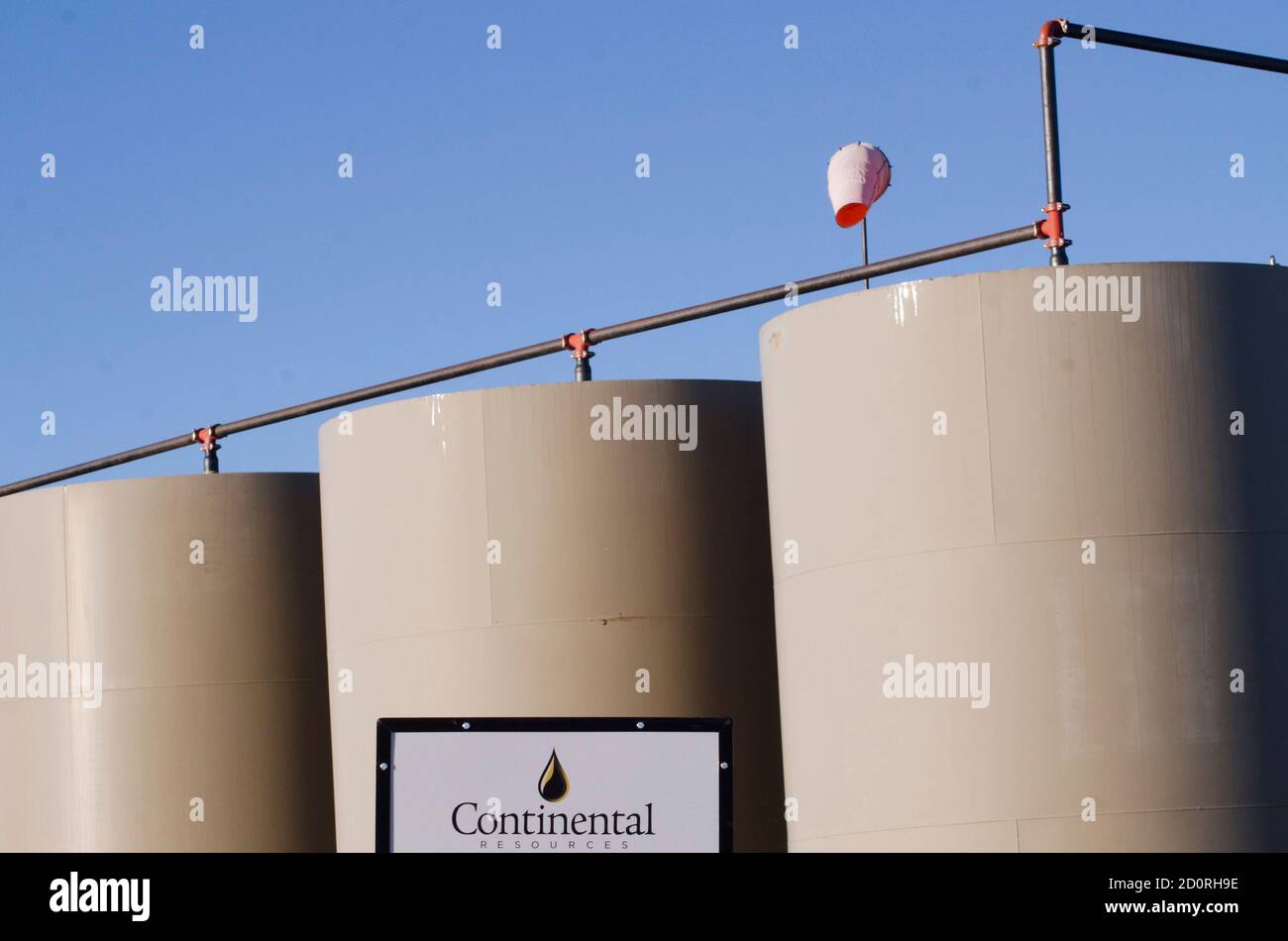 Storage tanks stand on a Continental Resources oil production site near Williston, North Dakota January 23, 2015.  REUTERS/Andrew Cullen   (UNITED STATES - Tags: BUSINESS ENERGY COMMODITIES) Stock Photo