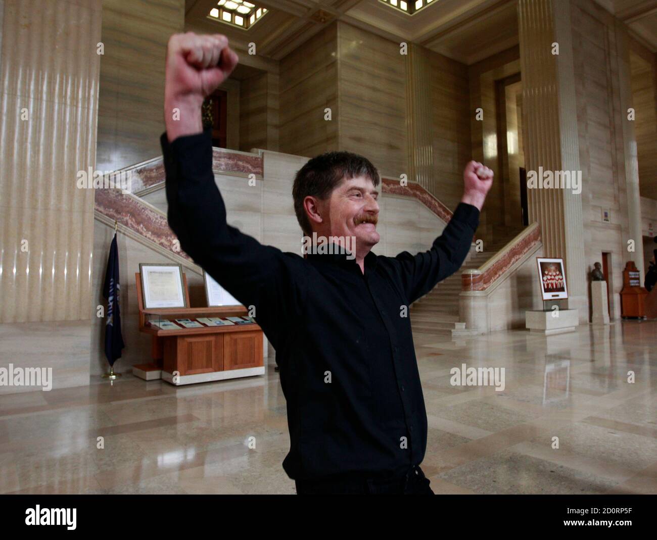 Plaintiff Dean Wilson reacts after hearing the Supreme Court's ruling on Insite, a drug addict safe injection site, in Ottawa September 30, 2011. Wilson was Insite's first user.  REUTERS/Chris Wattie       (CANADA - Tags: POLITICS HEALTH) Stock Photo