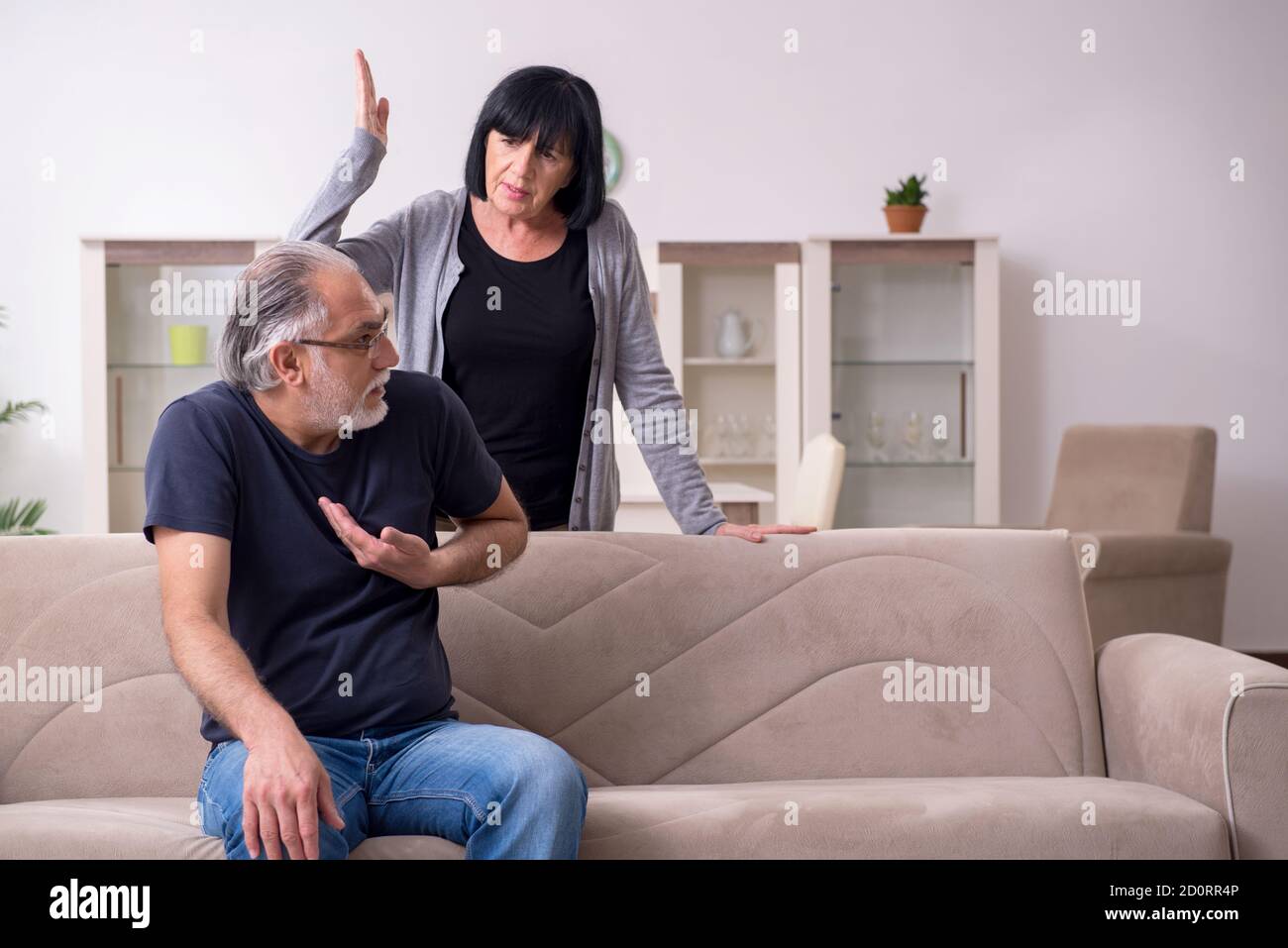 Old couple having argument at the home Stock Photo - Alamy