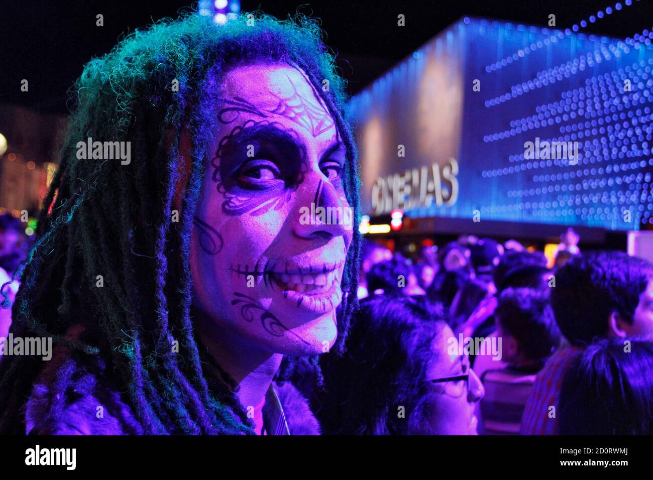 Kenny O'Brien, dressed as the Joker, poses while waiting for the midnight premiere of 'The Dark Knight Rises', the final instalment of Christopher Nolan's Batman trilogy, in Universal City, California, July 19, 2012.  REUTERS/Jonathan Alcorn (UNITED STATES - Tags: ENTERTAINMENT) Stock Photo