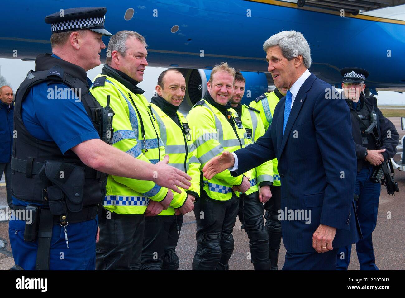 US Secretary of State John Kerry thanks London Metropolitian Police Officers for their help as he prepares to depart London at Stansted Airport near London April 11, 2013.       REUTERS/Paul J. Richards/Pool   (BRITAIN - - Tags: POLITICS) Stock Photo
