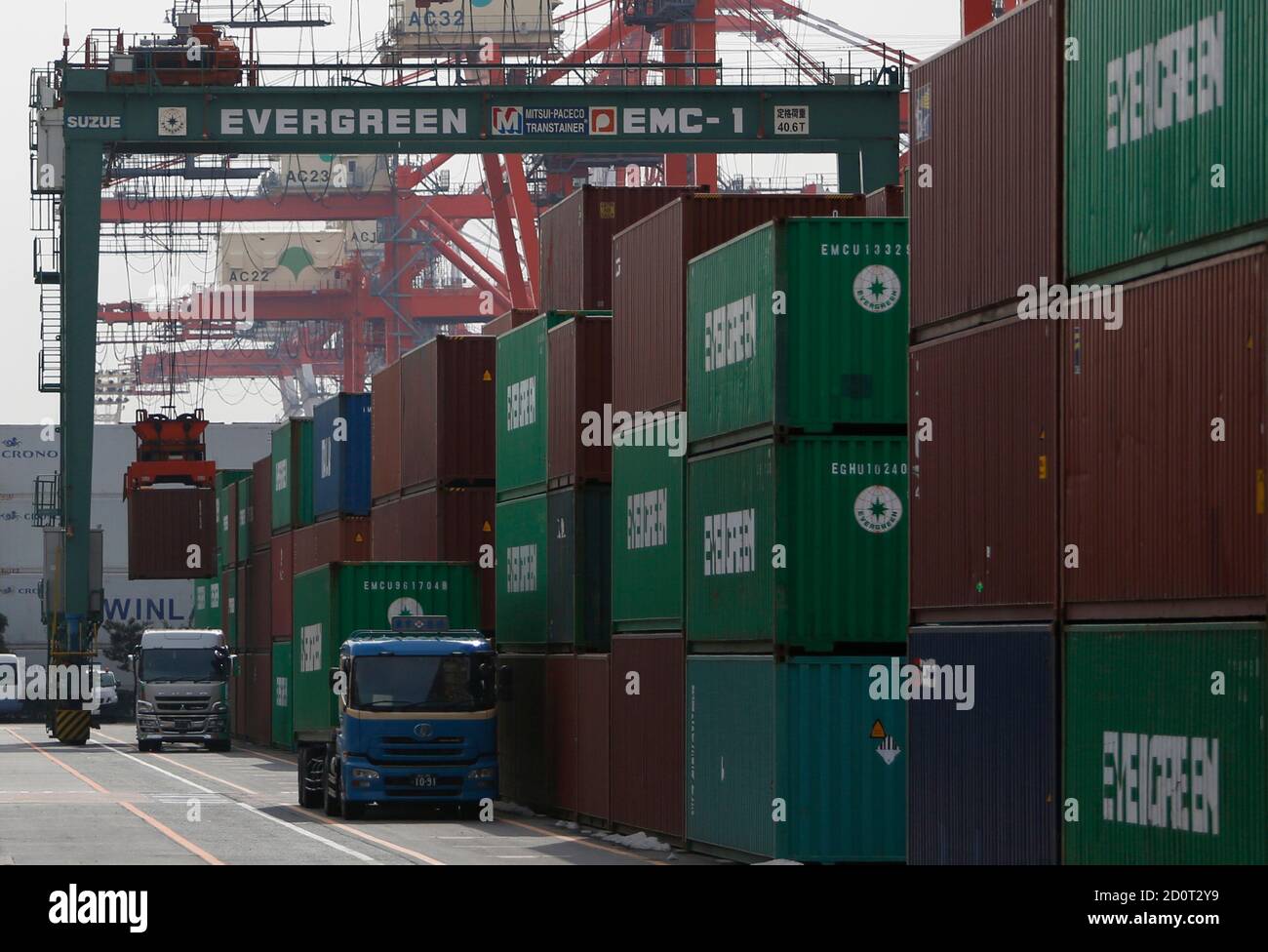 A Container Is Loaded From A Truck Inside A Container Area At A Port In Tokyo February 14 Japanese Exports Rose 9 5 Percent In January But Imports Outpaced Shipments As A