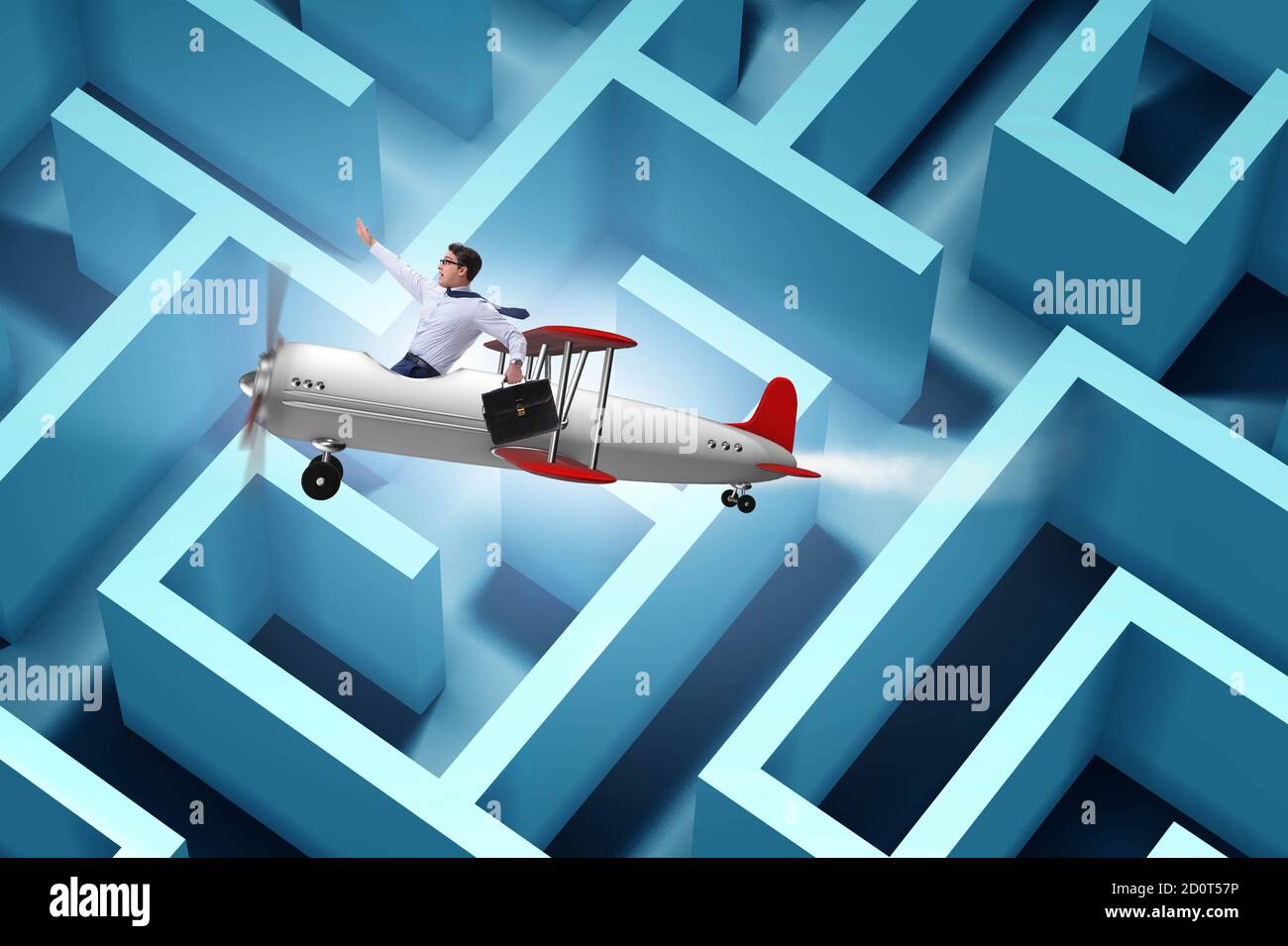 The businessman escaping from maze on airplane Stock Photo Alamy