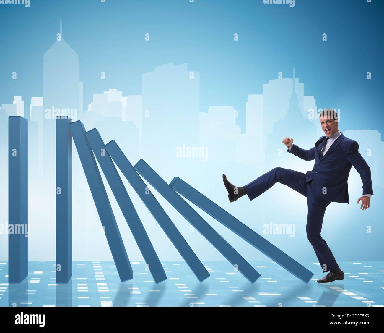 Pushing dominoes causing chain reaction hi-res stock photography and ...