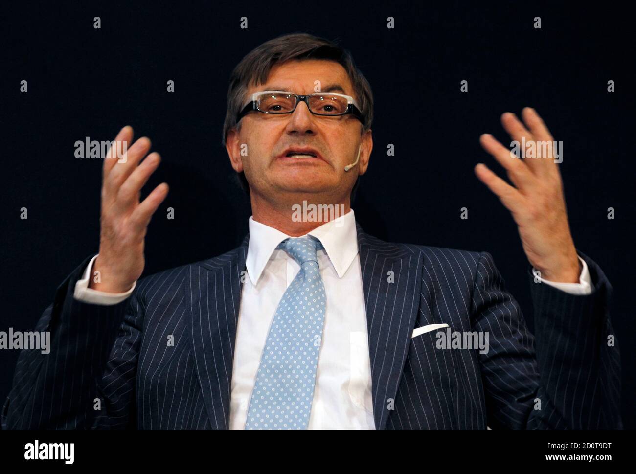 Mario Moretti Polegato, president of Italian shoemakers Geox, gestures as  he speaks during a meeting at the ABI headquarters in Rome April 14, 2011.  REUTERS/Alessandro Bianchi (ITALY - Tags: BUSINESS Stock Photo - Alamy