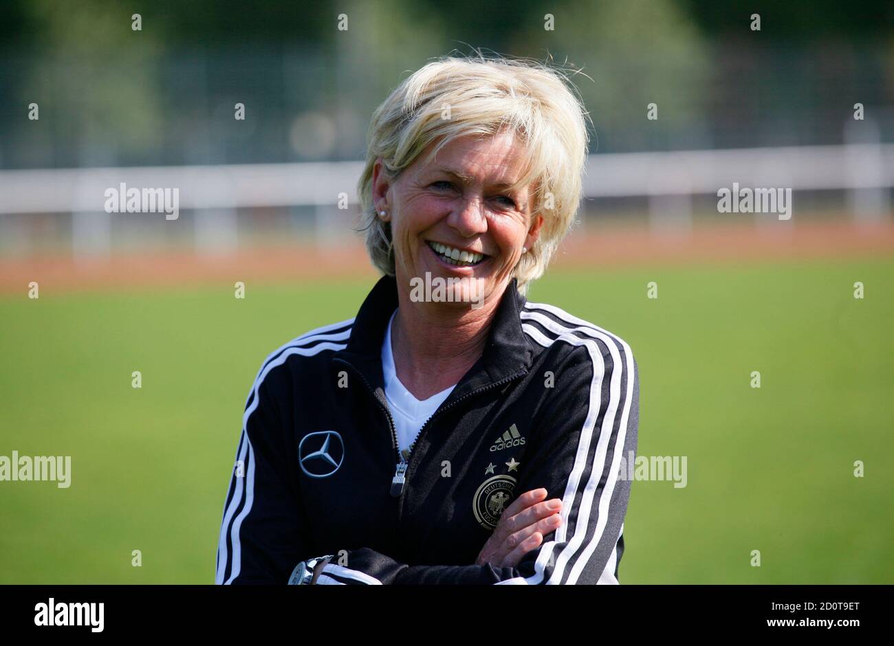 Silvia Neid, coach of Germany's women's soccer team poses during the  official team photo session in Cologne April 18, 2011. The German team is  the defending champion in the FIFA Women's World