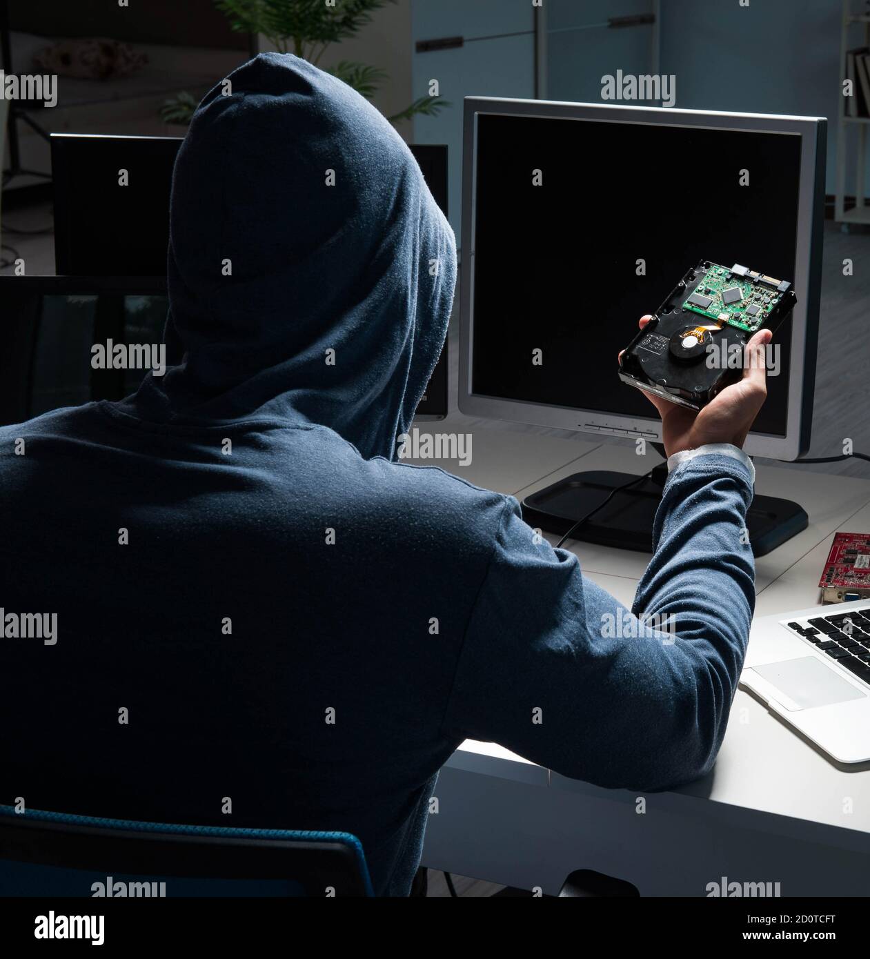 The hacker hacking computer at night Stock Photo - Alamy