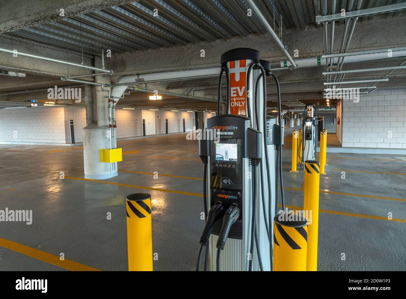 Public charging station for electric cars and vehicles, Boston USA Stock Photo