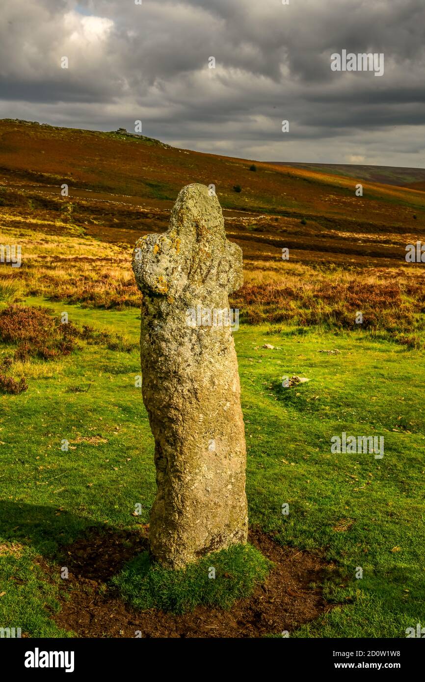 Old stone St. Benet's Cross on the moor at golden hour Stock Photo