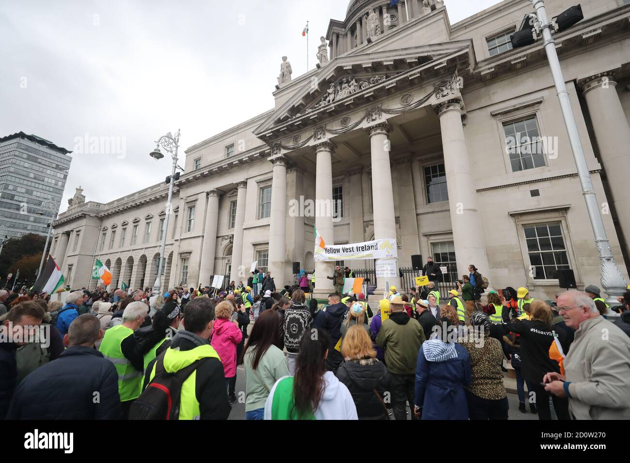 People attend an anti-mask protest organised by Health Free Ireland at Custom House in Dublin. Stock Photo