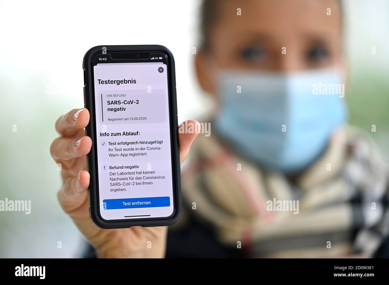 Negative Test Result Woman With Face Mask Showing Smartphone With Corona Warn App Corona Crisis Stuttgart Baden Wurttemberg Germany Europe Stock Photo Alamy