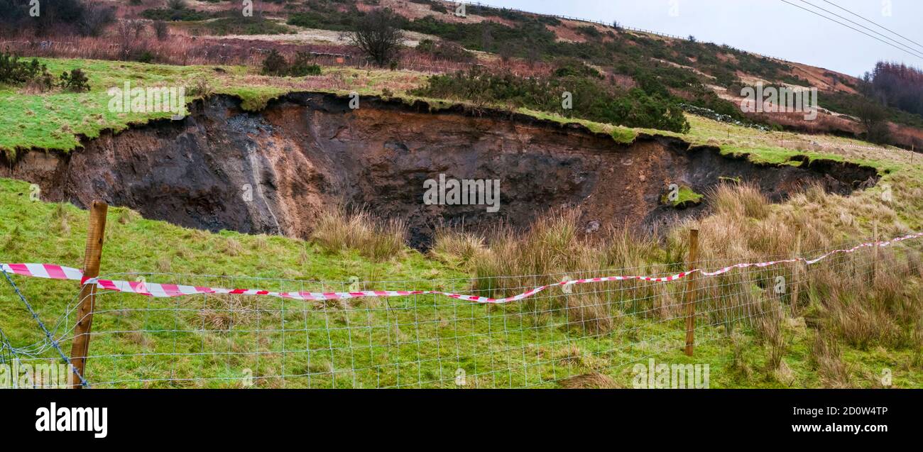 Massive sinkhole caused by a collapse of shale overburden into deep mine workings underground