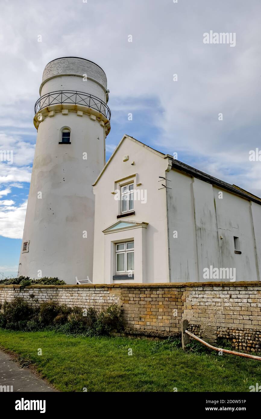The old lighthouse on the cliffs overlooking Hunstanton beach ob the ...