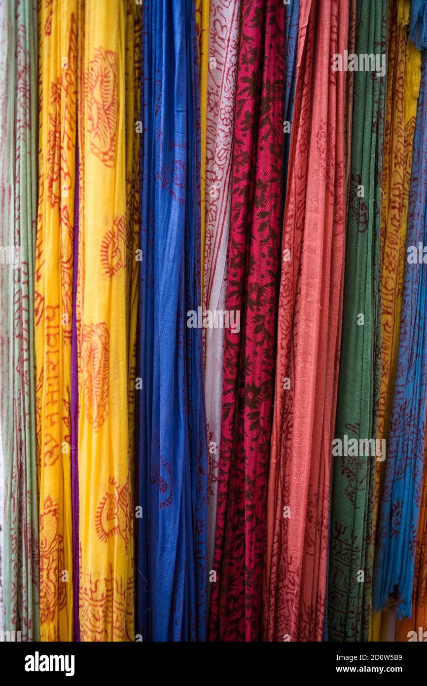 Printed fabrics for sale, Calle de la Calderería Nueva, El Albaicín, Granada, Andalusia, Spain Stock Photo