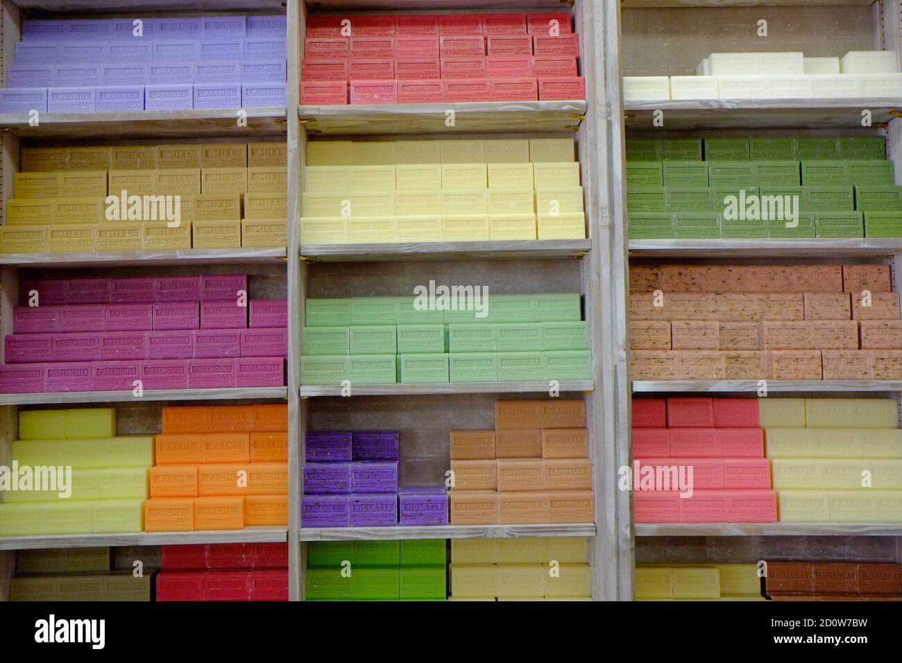 Colorful cupboard of soap bars displayed in a shop Stock Photo