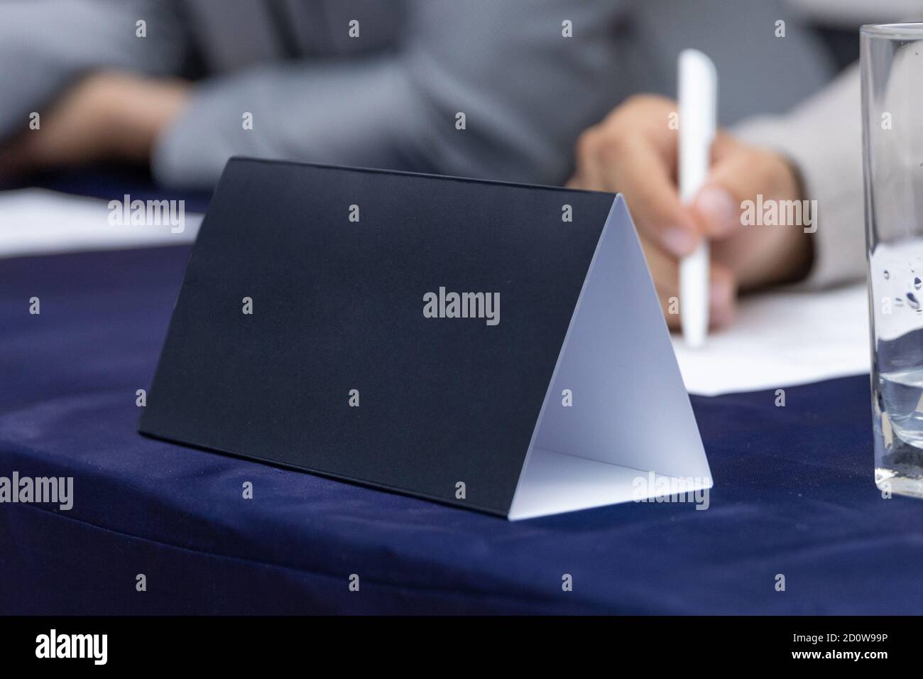 Conference event speaker paper name plate close up Stock Photo Alamy