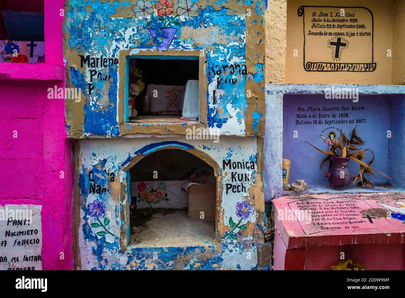 Colorful niches and above-ground tombs, adorned with flowers, are seen  during the bone cleansing ritual at the cemetery in Pomuch, Mexico Stock  Photo - Alamy