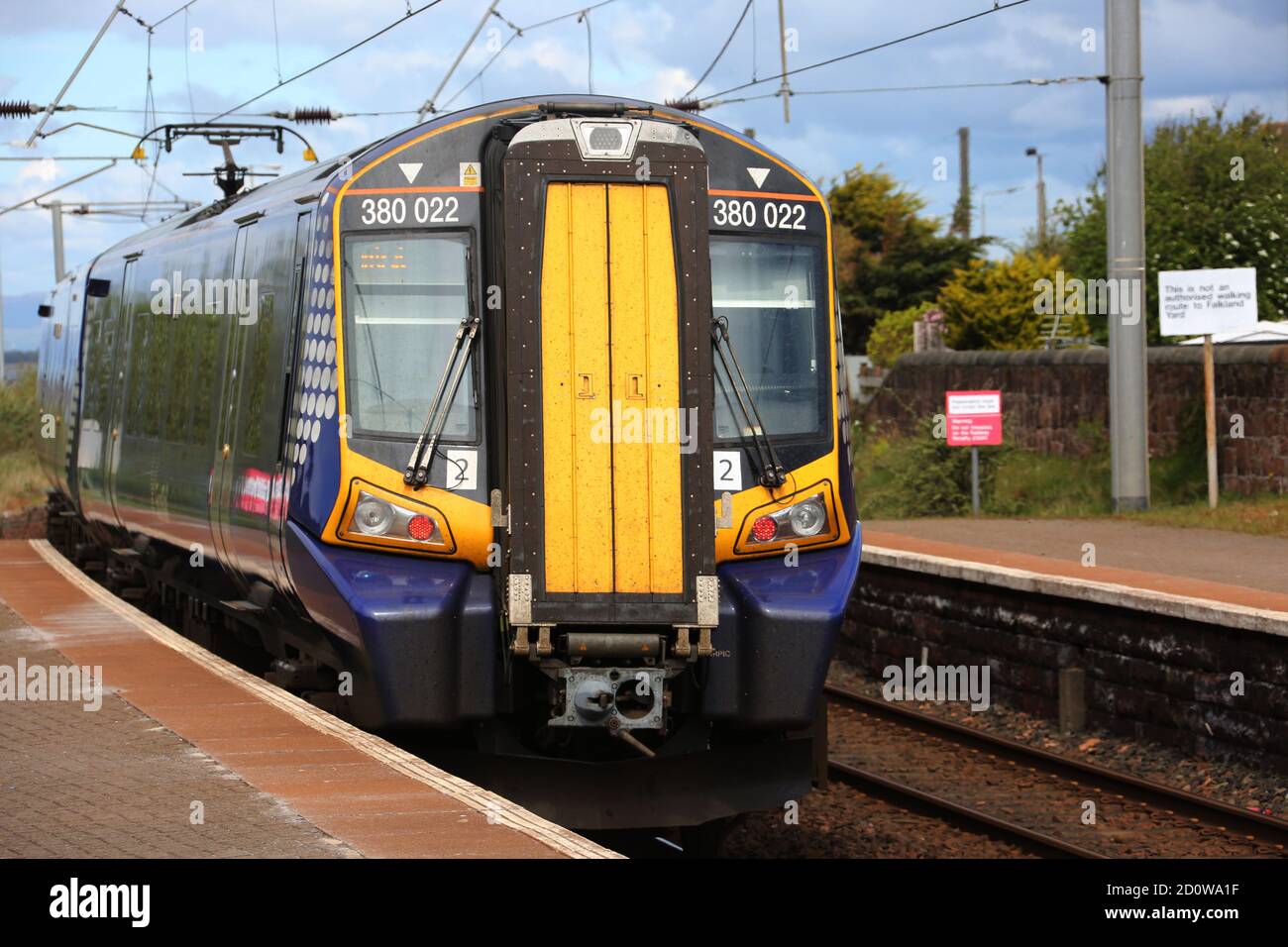 Scotrail Abellio passenger train approaching & stopping at Newton on Ayr railway station , Ayr, Ayrshire, Scotland, UK Stock Photo