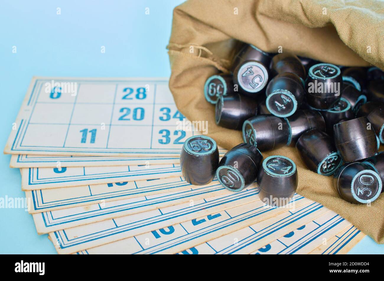 Board game. Lotto. Cards and a bag of barrels. Close up. Stock Photo